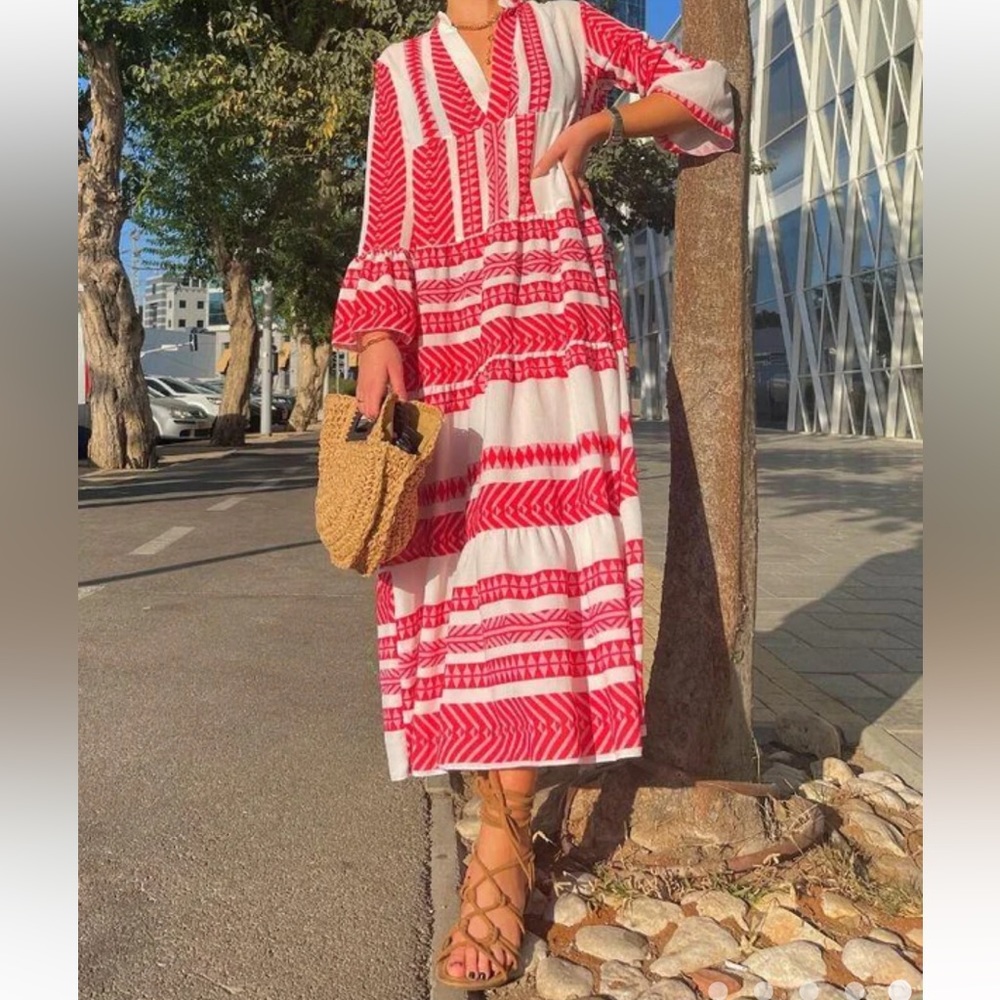 Silk and Salt maxi dress with bell sleeves and tiered bottom